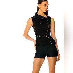 Edgy, trendy, sophisticated belted vest/top. Chic style in abundance.
